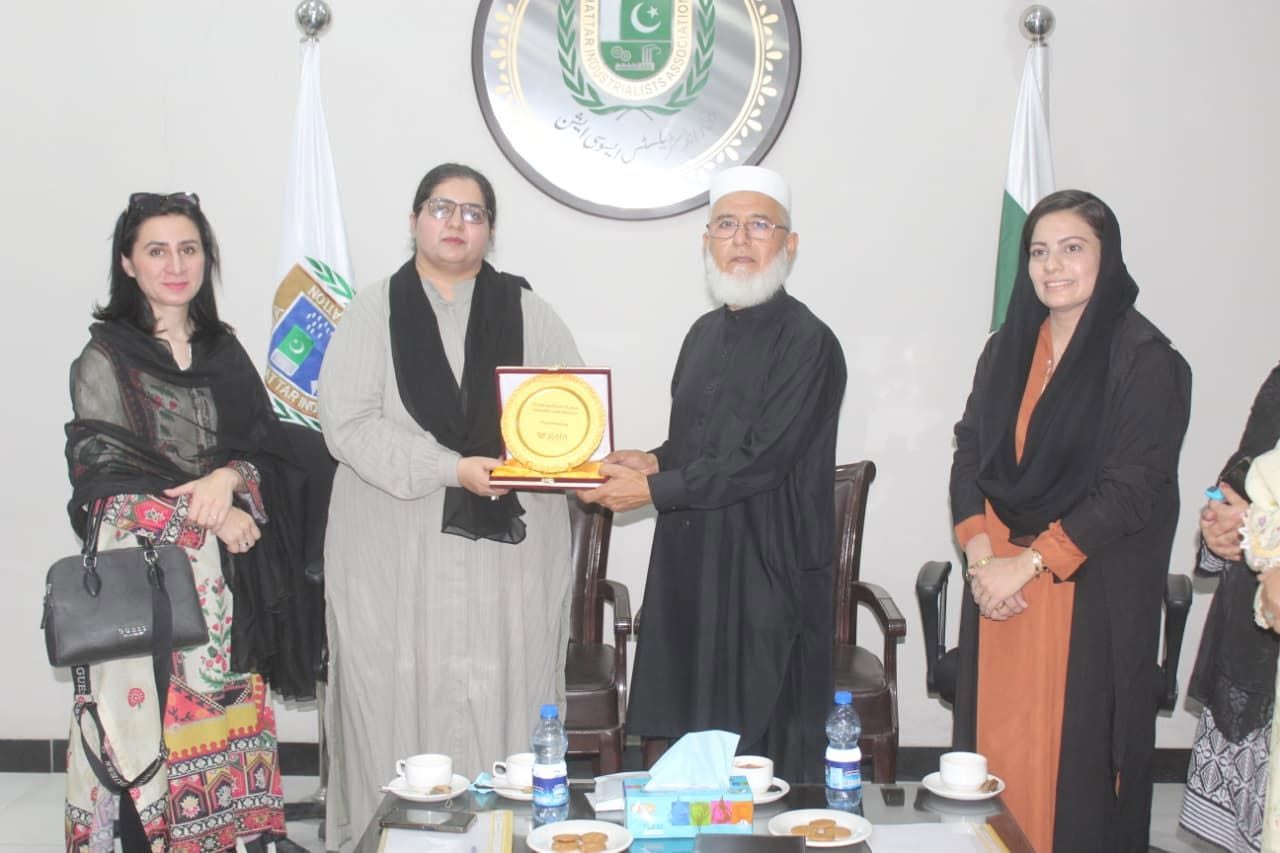 Mr. Muhammad Atta Ur Rehan Acting Chairman HIA give shield to President WWC Peshawar
